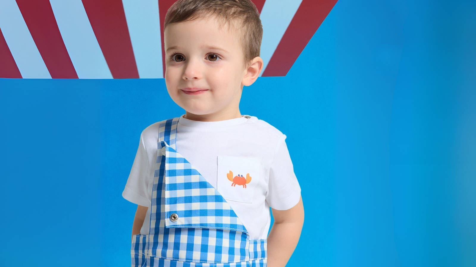 Elegant children playing outdoors wearing luxury kidswear that reflects their personalities and family values