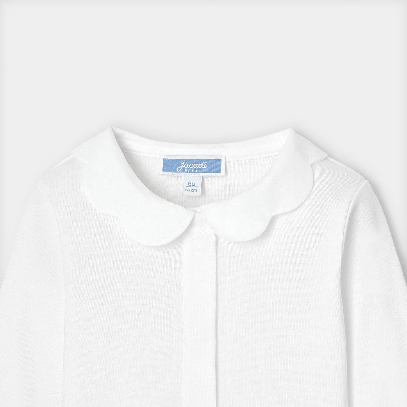 Baby girl bodysuit with scalloped collar
