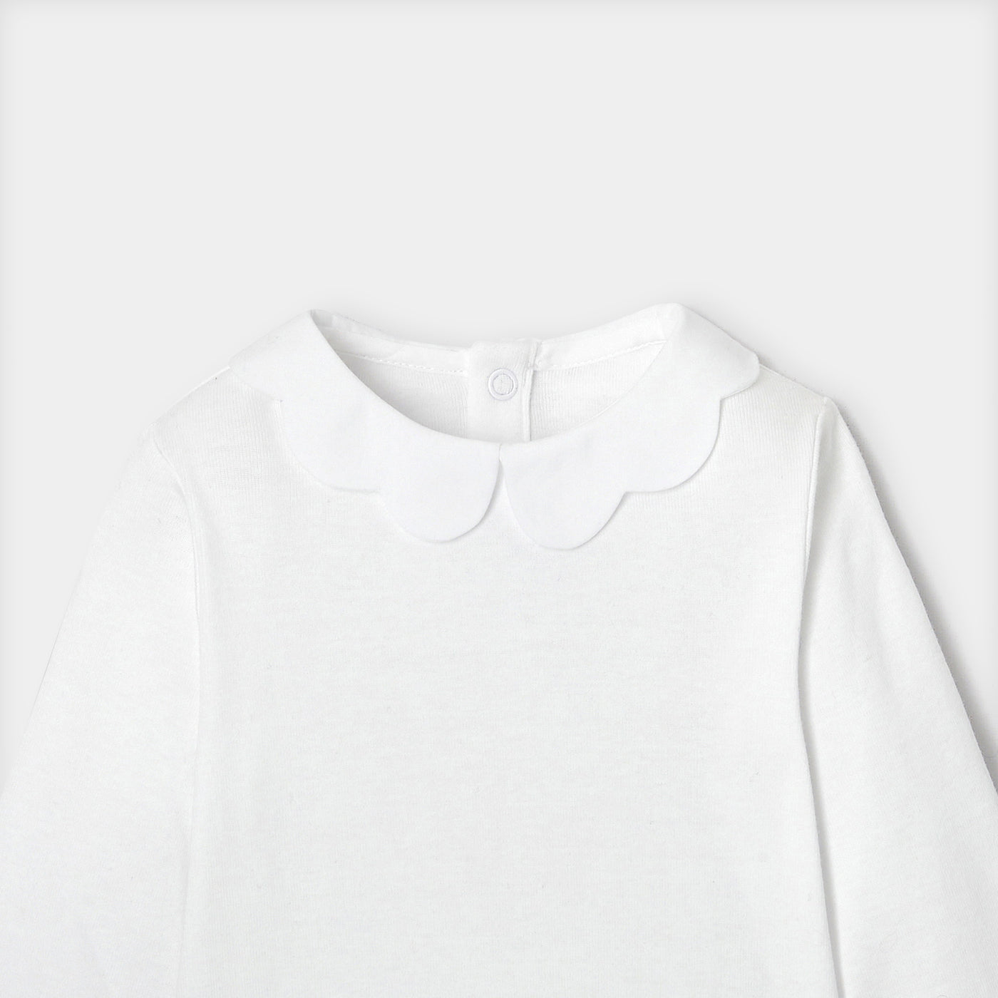 Baby girl bodysuit with scalloped collar